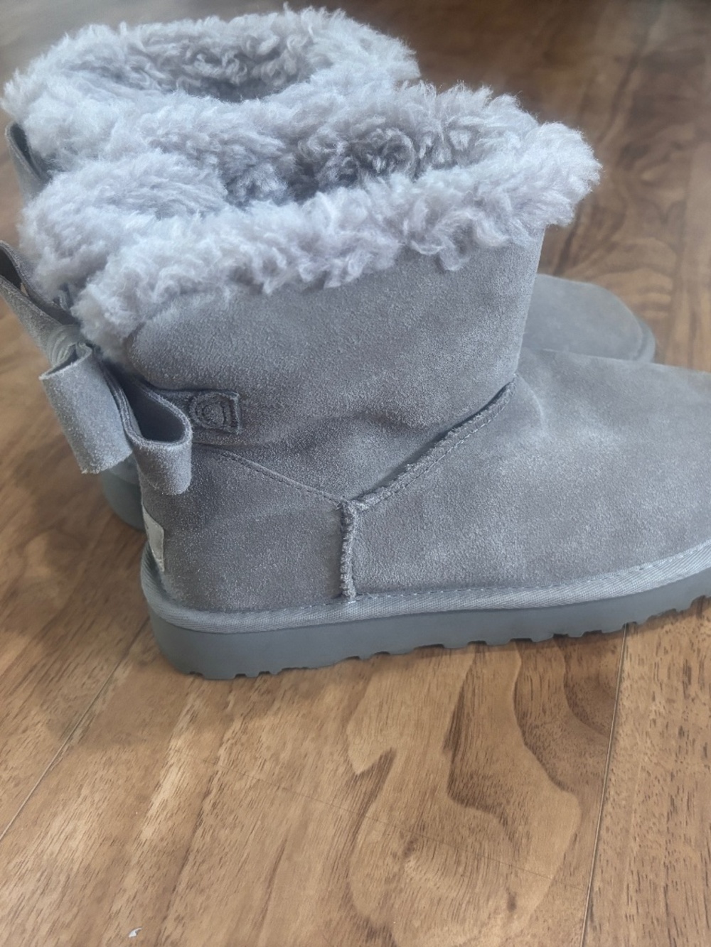 NWOT UGG Mini Bailey Bow II Gray Suede Sheepskin Bow Boots Women’s Size 6